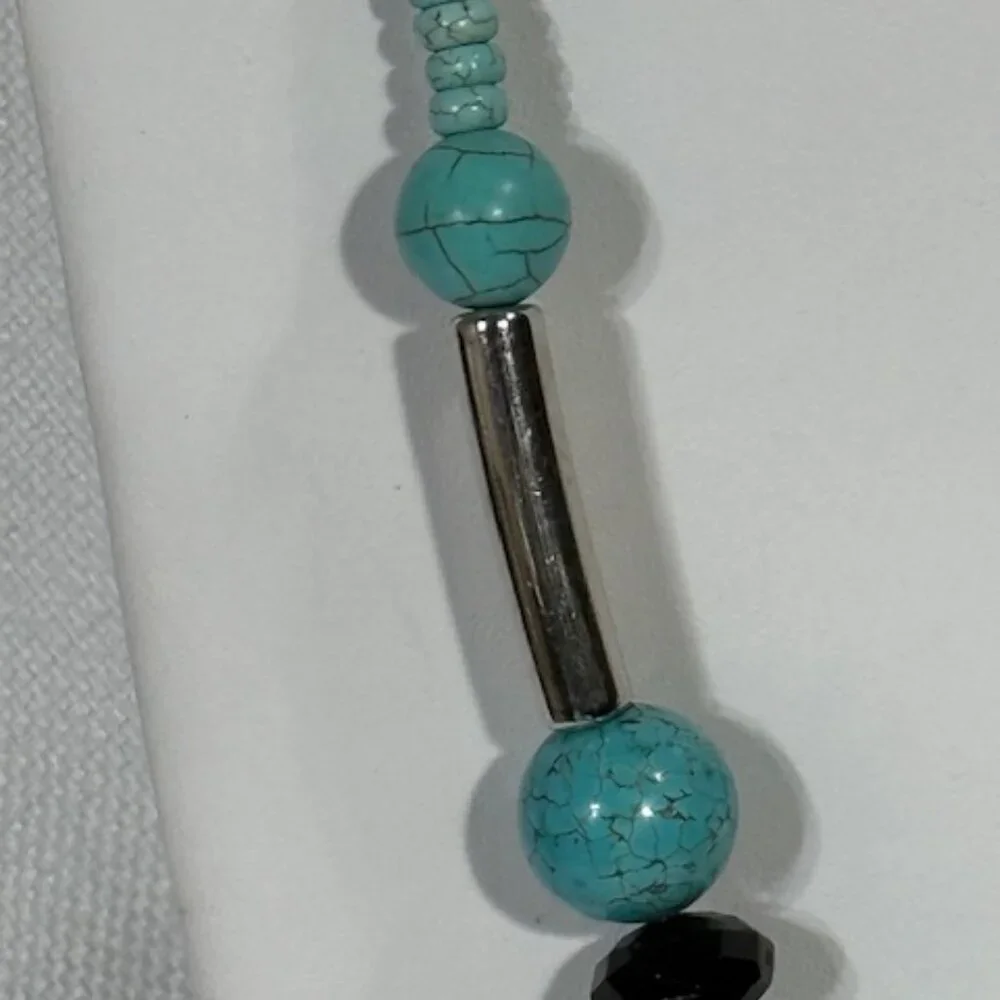 Silver-tone and turquoise-colored 18